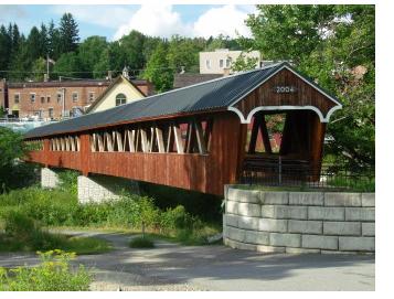 Built in 2004, the Riverwalk Covered Bridge has beautiful views of the river.