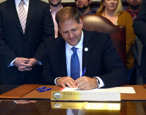 Governor Chris Sununu signs SB 234, relative to needle exchanges.