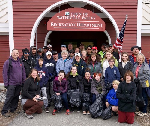 Volunteers help to clean Waterville Village, NH.